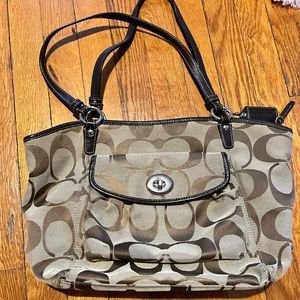 Coach purse. Authentic. Has some wear on the corners